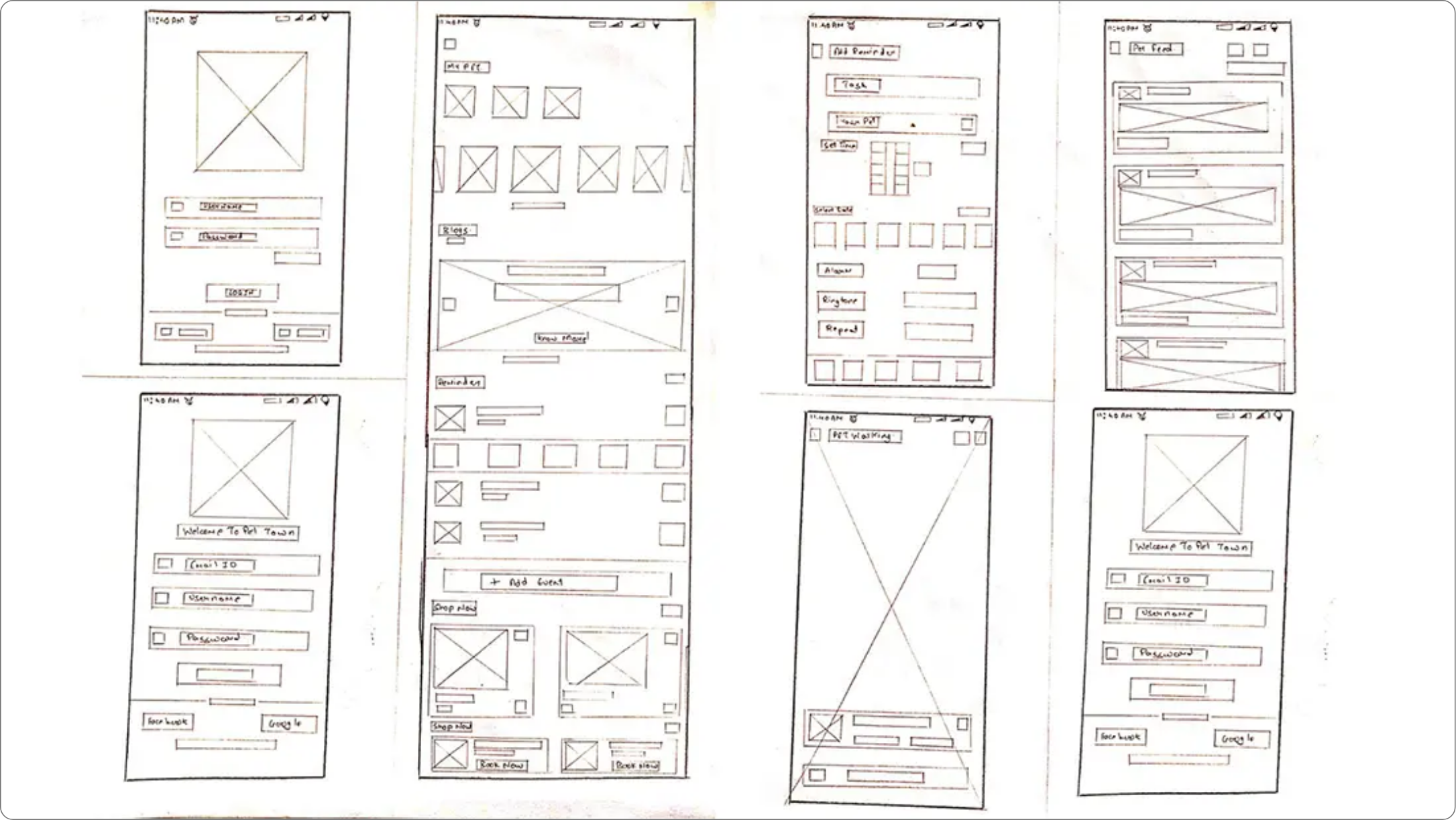 Hand-drawn paper wireframe sketches of initial mobile app screens.